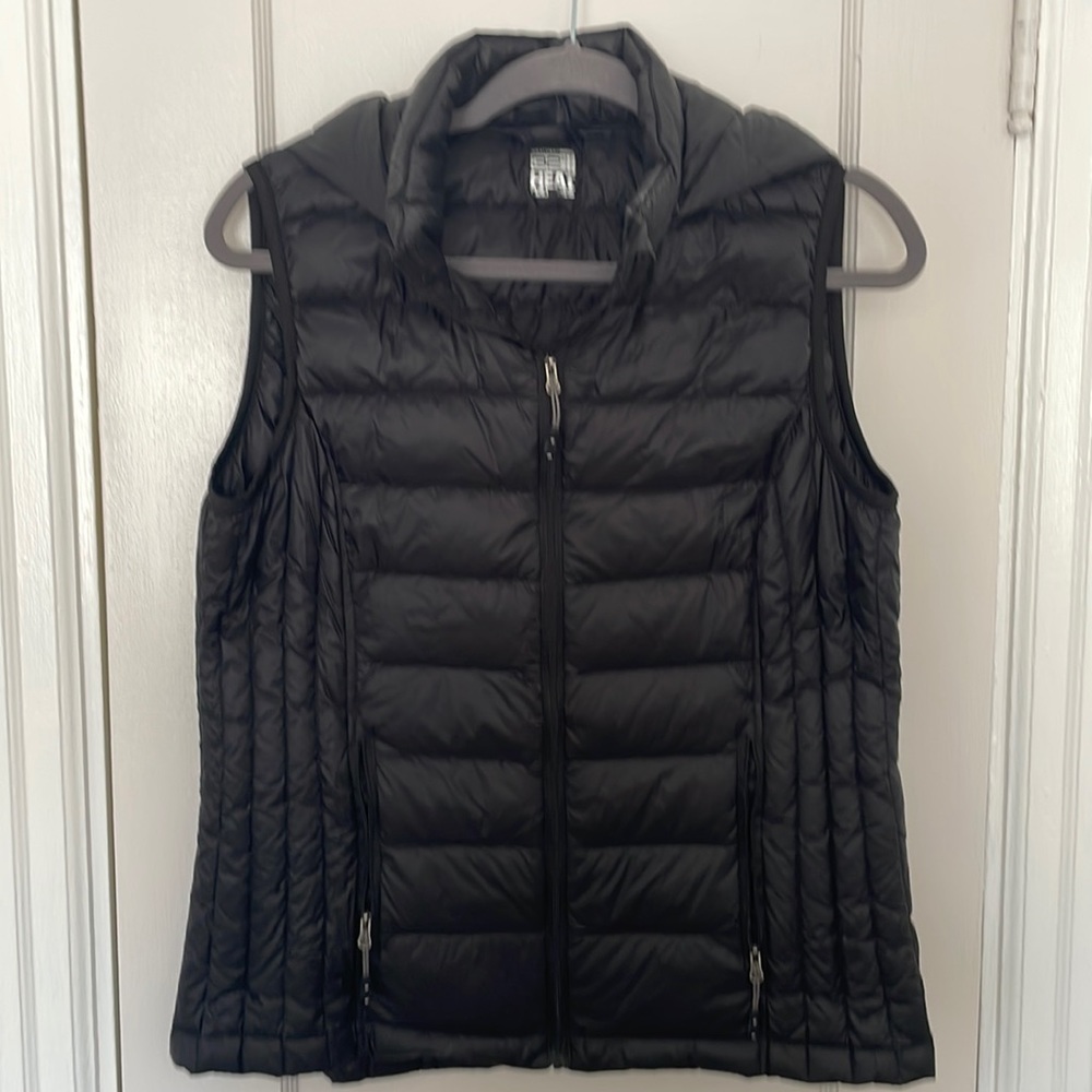 Puffer vest with hood.